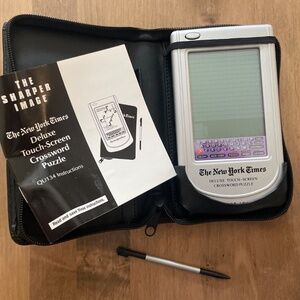 THE SHARPER IMAGE -The New York Ties Deluxe Touchscreen CROSSWORD PUZZLE GAME